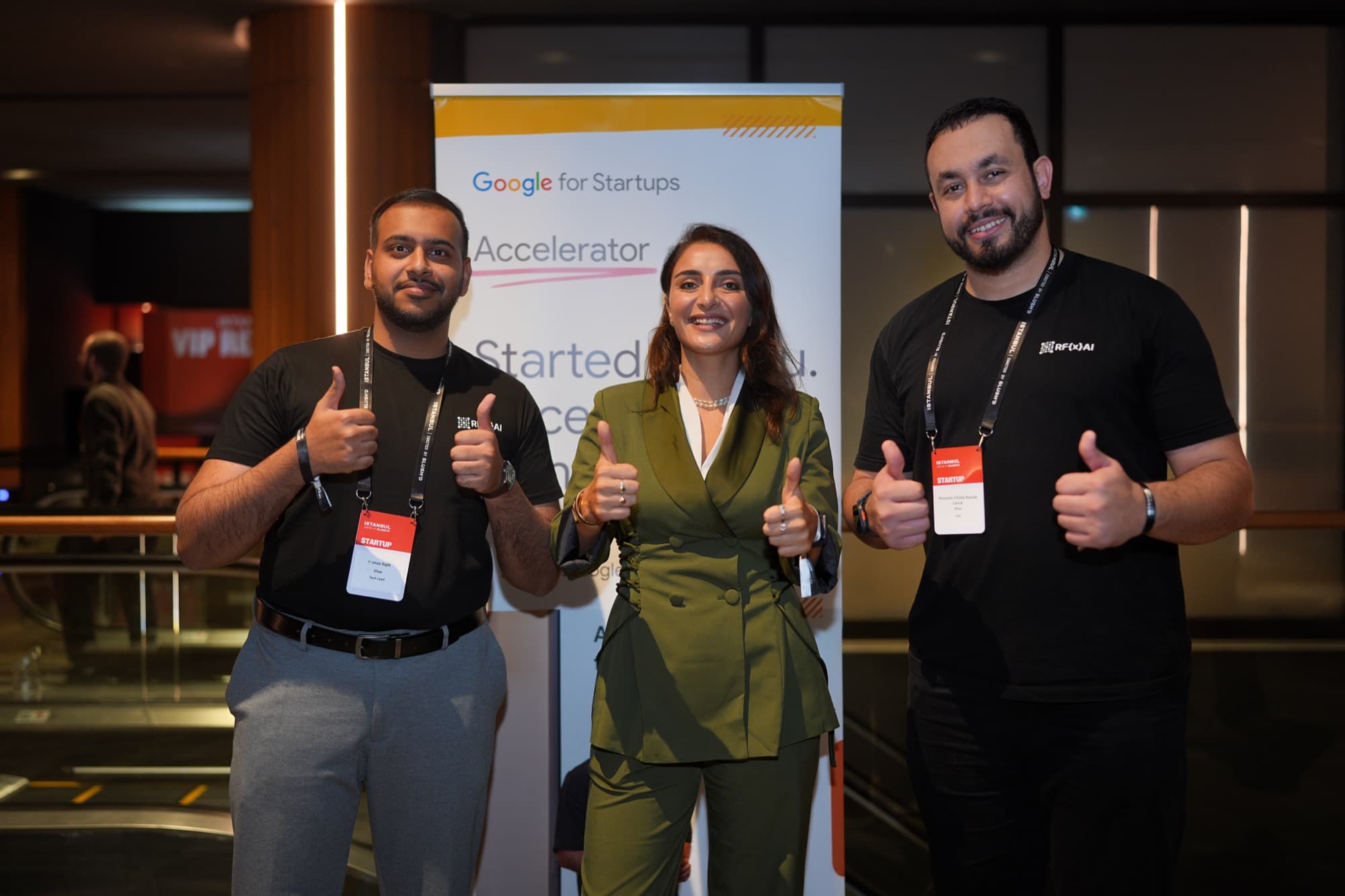 RFxAI team members in front of the Google for Startups Accelerator banner