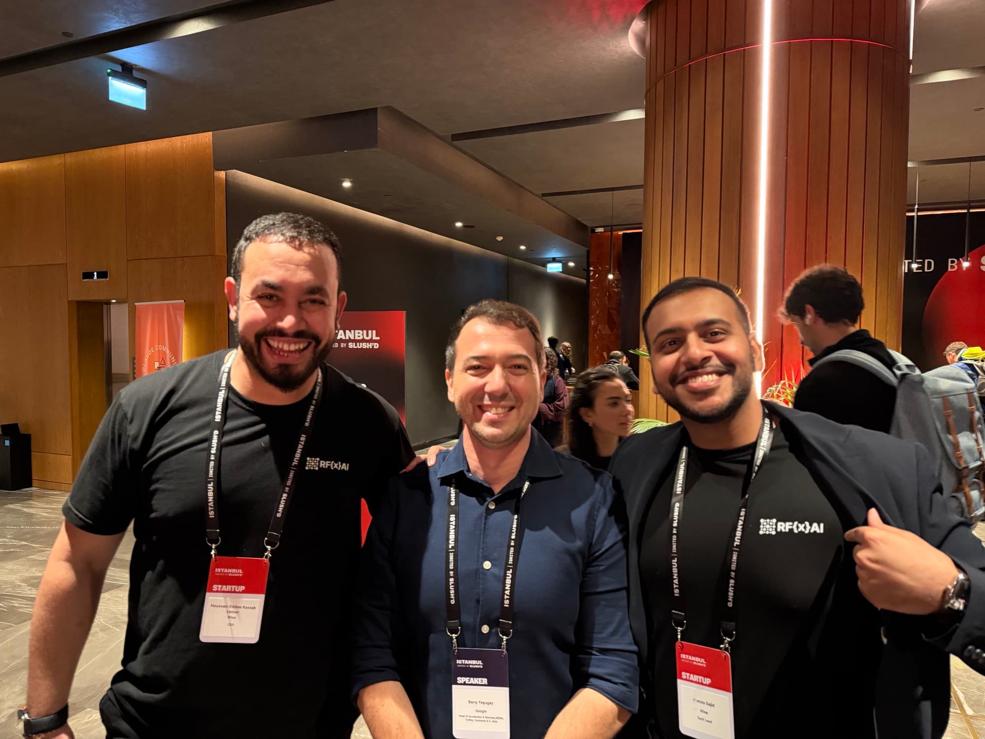 RFxAI team members networking with a speaker at the Istanbul Demo Day
